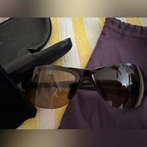Nike Sunglasses-tortoise-shell style performance frames featuring brown lenses